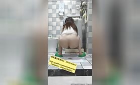Girl pooping in toilet 2