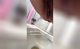 Beautiful girl poops in the toilet 26
