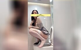 Beautiful girl poops in the toilet 49