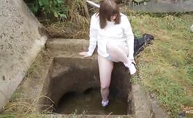 Slutty Chick Gets Dirty with Dildos in Steamy Cow Manure Pit Outside