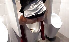 Two Filthy Scat Hotties Pissing & Shitting in Men's Urinal with Anal Plug in the Ass